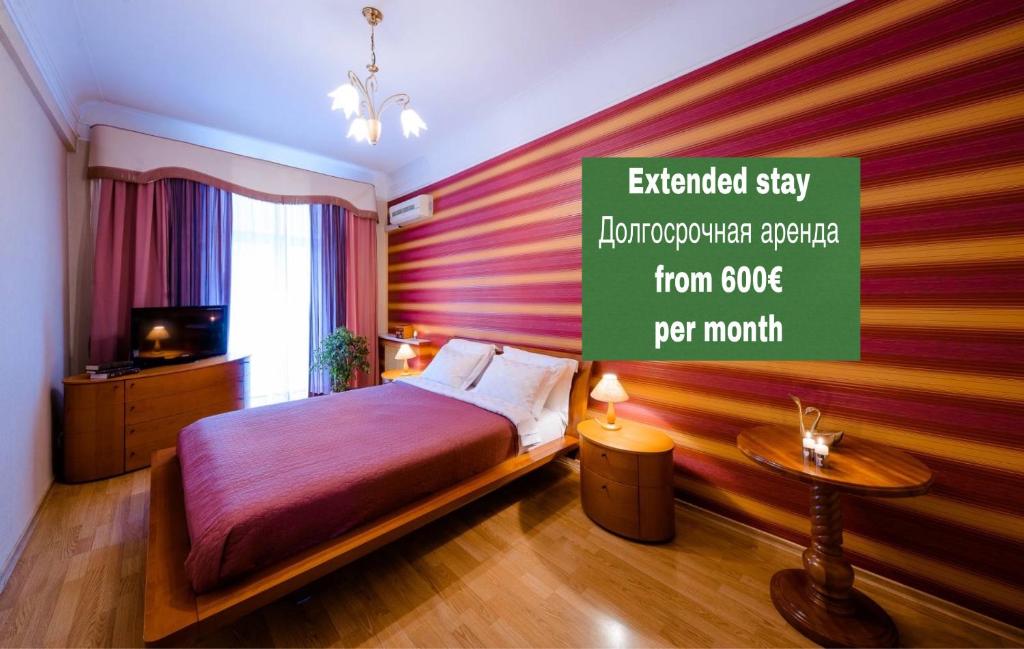 Postel nebo postele na pokoji v ubytování Boutique Apart-Hotel Sherborne