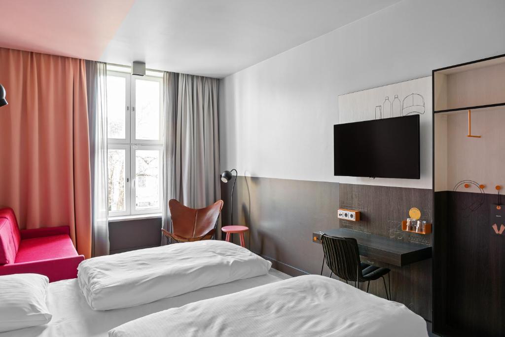 Postel nebo postele na pokoji v ubytování Comfort Hotel Karl Johan