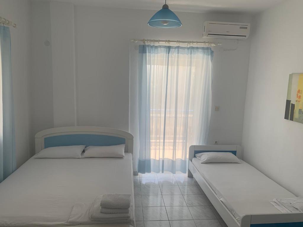 Postel nebo postele na pokoji v ubytování Mare - Rooms