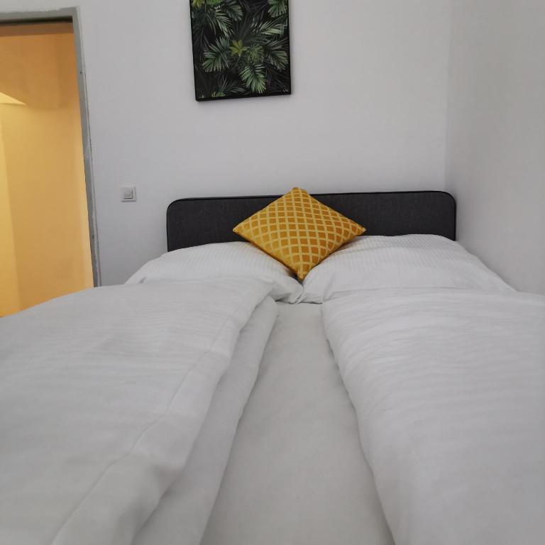 Postel nebo postele na pokoji v ubytování Speedyrooms Vienna