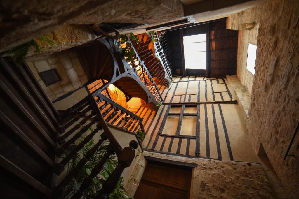 an overhead view of a staircase in a building at Amañi Hostel in La Réole