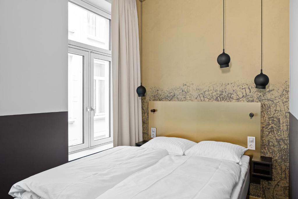 Postel nebo postele na pokoji v ubytování Comfort Hotel Karl Johan