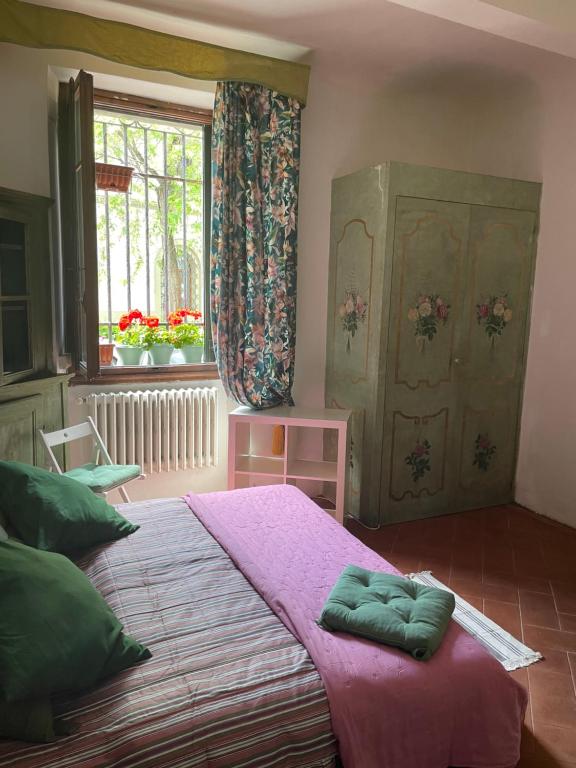 A bed or beds in a room at B&B Alla Corte dei Medici
