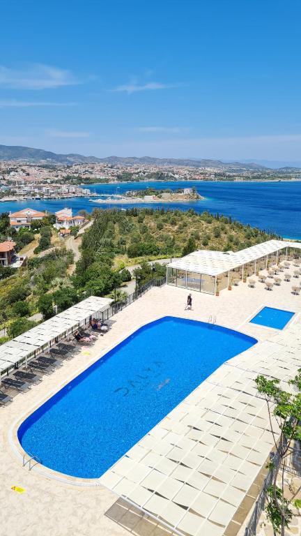 an aerial view of a swimming pool at a resort at Dalya Resort Aqua & Spa Hotel Datça in Datca