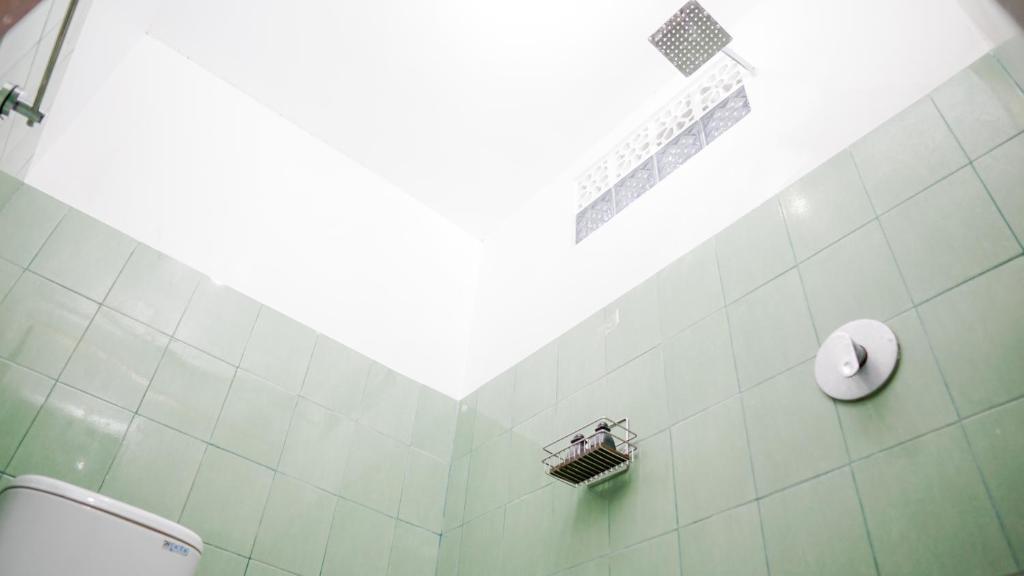 Koupelna v ubytování Pondok Pekak Guesthouse