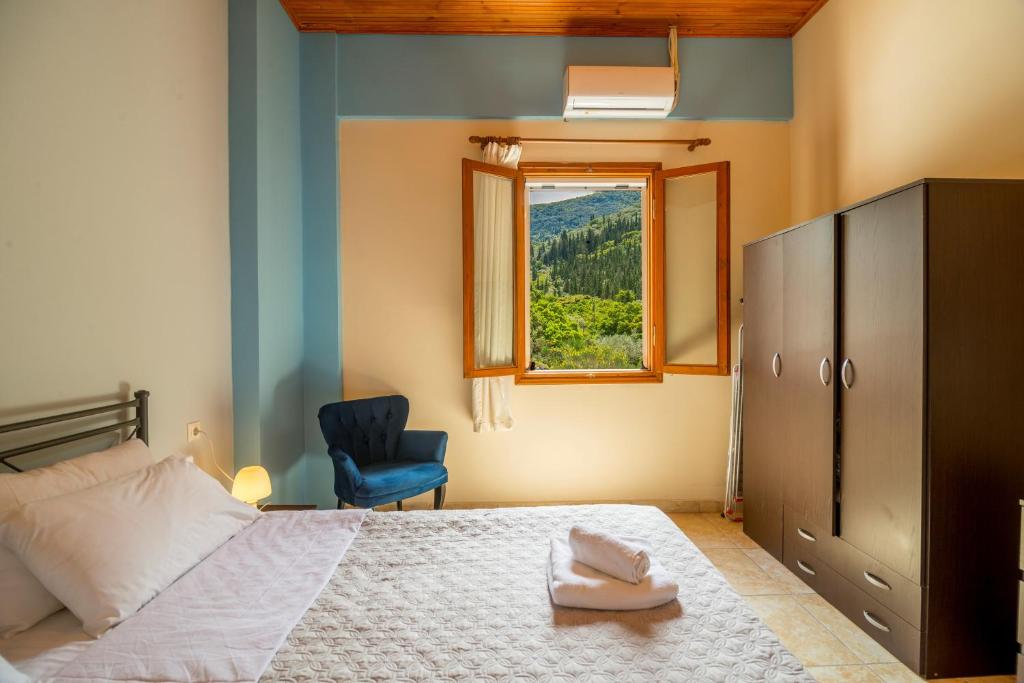 Posteľ alebo postele v izbe v ubytovaní Ntamari Apartments