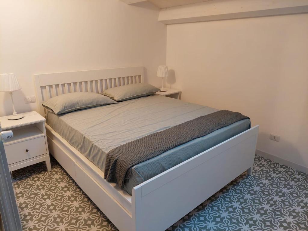A bed or beds in a room at Casa Gioconda