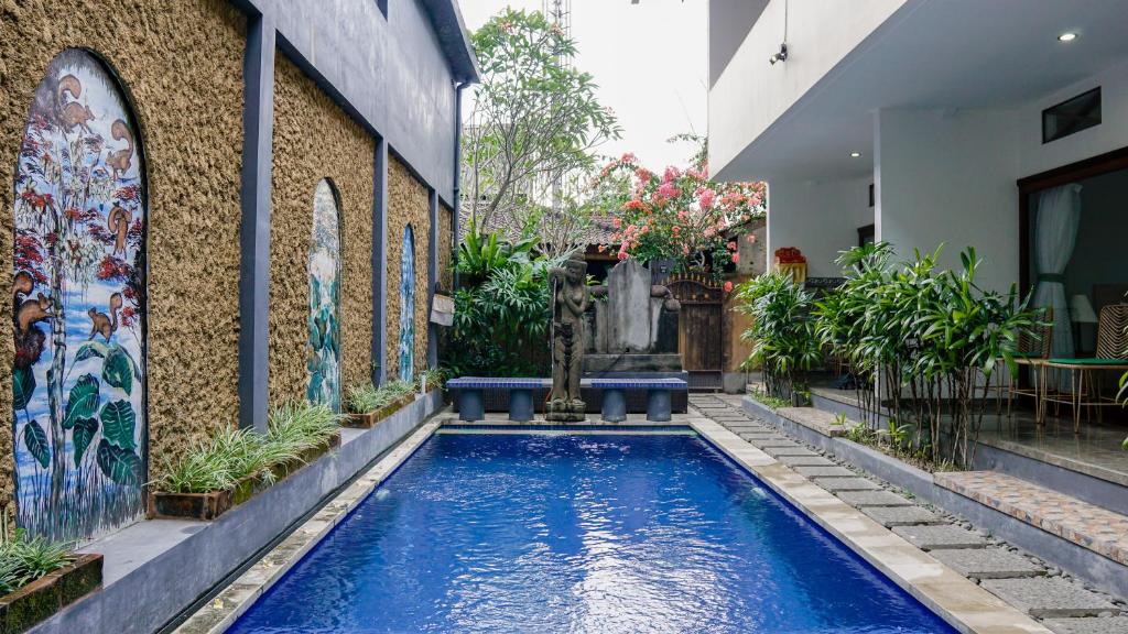 Bazén v ubytování Pondok Pekak Guesthouse nebo v jeho okolí