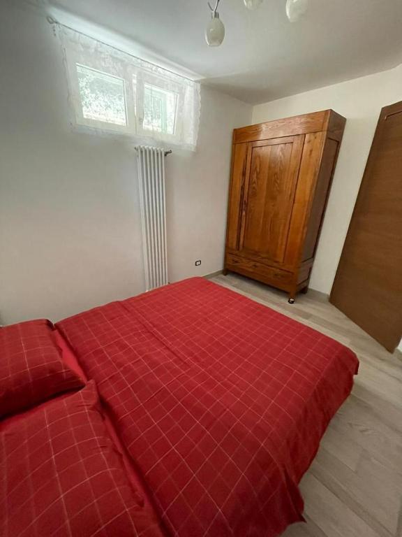 Posteľ alebo postele v izbe v ubytovaní L'Uliveto