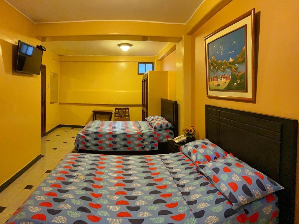 Postel nebo postele na pokoji v ubytování Hostal Montesa
