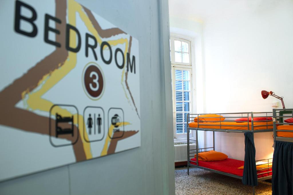 Postel nebo postele na pokoji v ubytování OStellin Genova Hostel