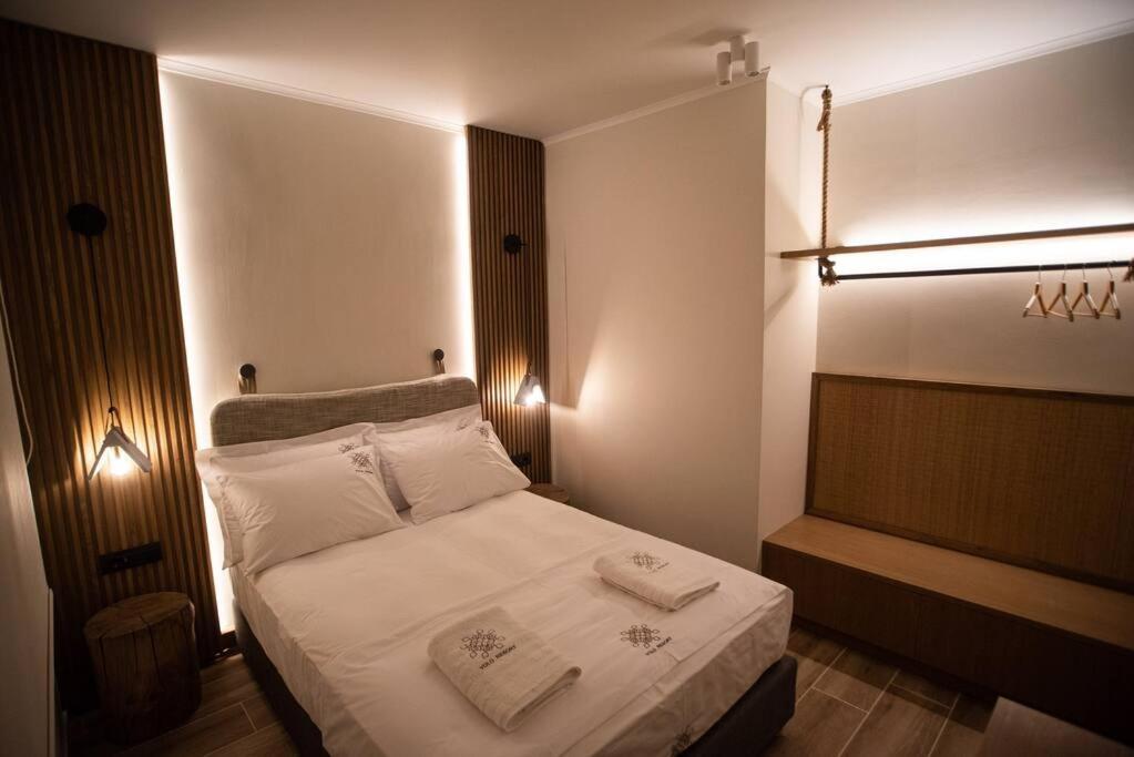 Postel nebo postele na pokoji v ubytování YOLO Resort - Notte