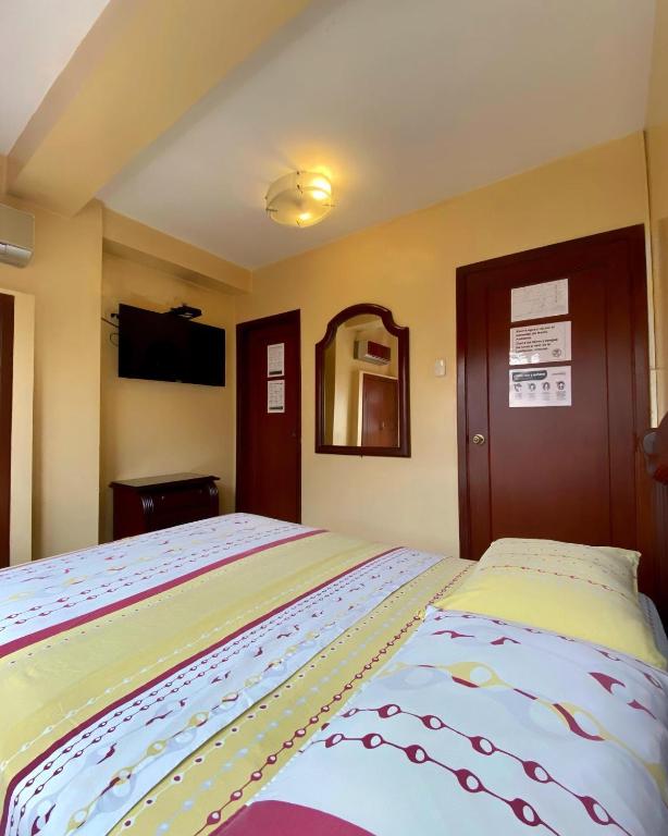 Postel nebo postele na pokoji v ubytování Hostal Montesa
