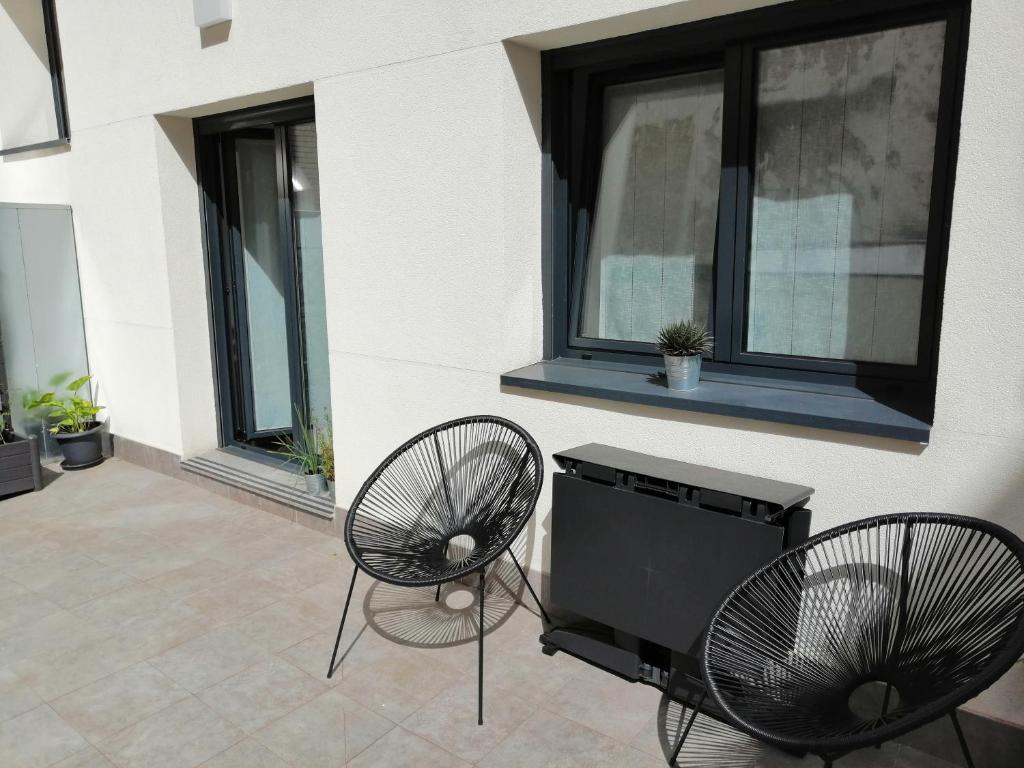 A balcony or terrace at Dindurra Gijón Centro-Parking gratuito