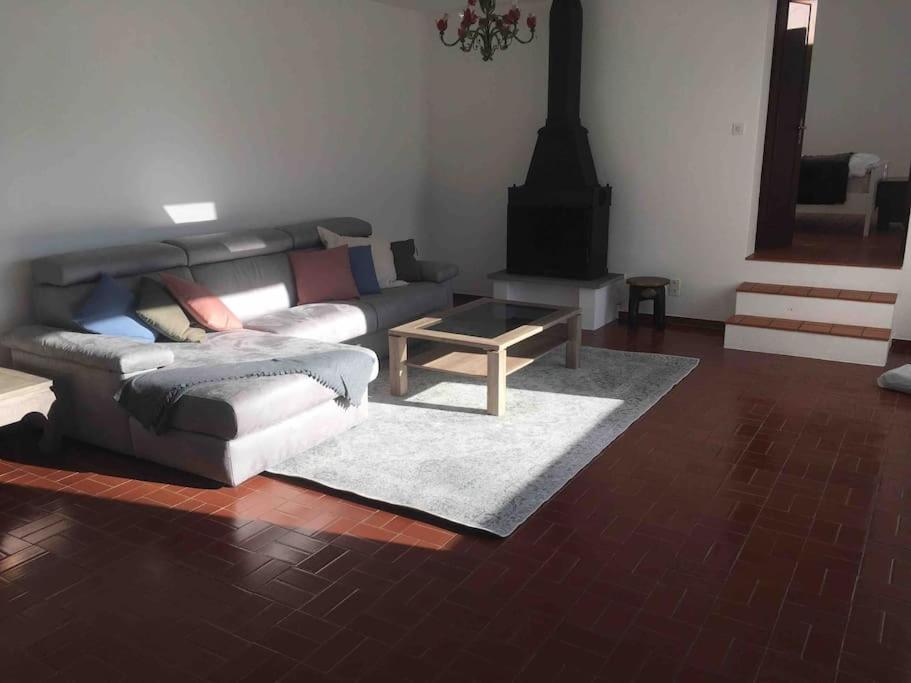 Posezení v ubytování Morcote Cottage