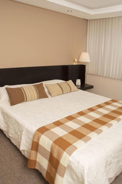 Llit o llits en una habitació de Walther Suites