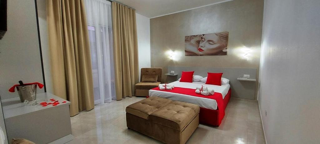 Postel nebo postele na pokoji v ubytování IL GIGLIO B&B