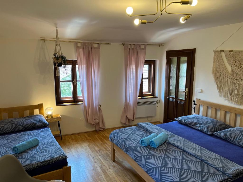 Postel nebo postele na pokoji v ubytování New Fajka