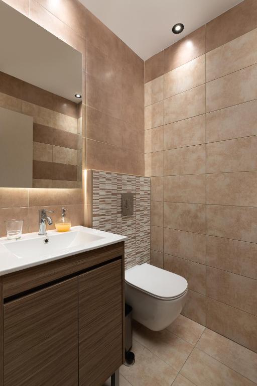 Kúpeľňa v ubytovaní Rhodes SkyLine Suites
