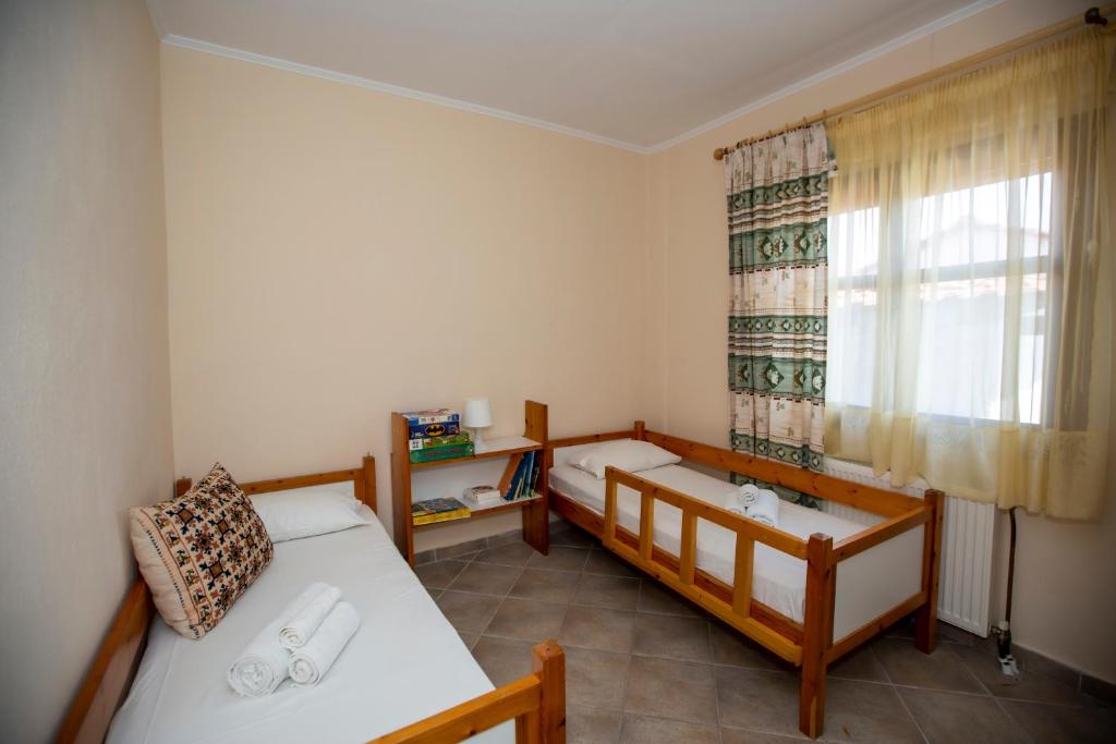 Postel nebo postele na pokoji v ubytování Traditional beach house