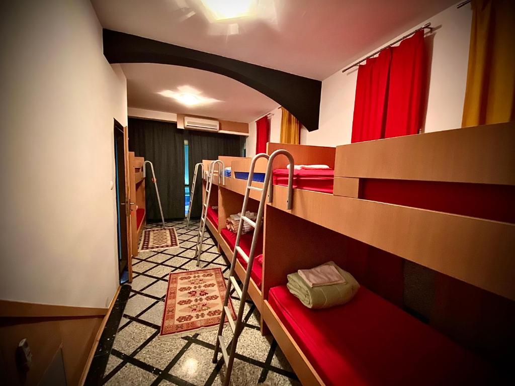 Postel nebo postele na pokoji v ubytování Hostel Backpackers