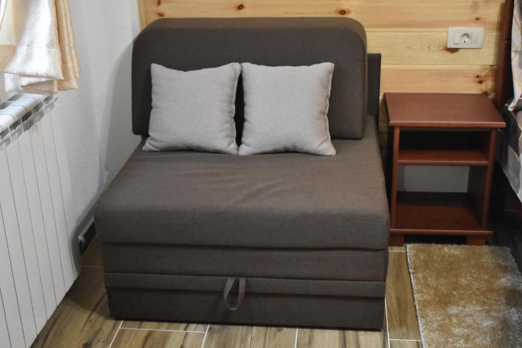 Posezení v ubytování Deluxe Studio & Rooms Zarubica