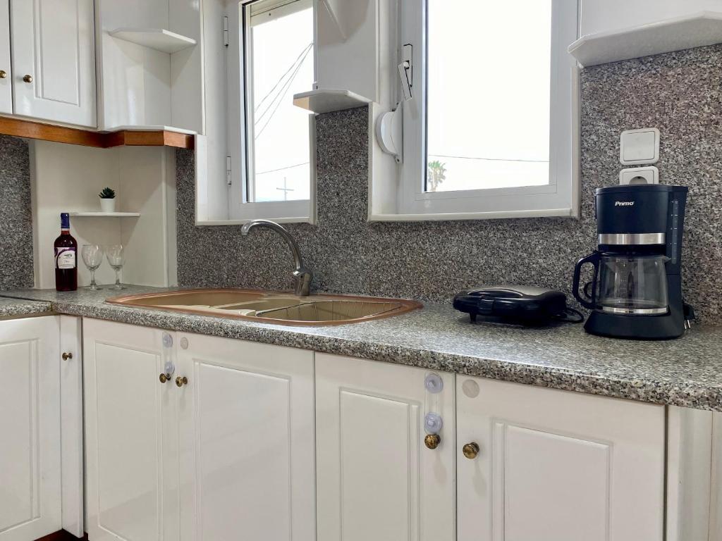 A kitchen or kitchenette at Panoramic View, House, at Zipari Village "2"