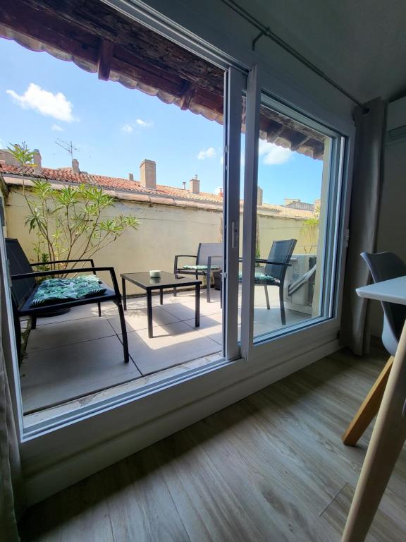 Balkón nebo terasa v ubytování La Dolce Vita Nîmoise Terrasse 100 m des Arènes