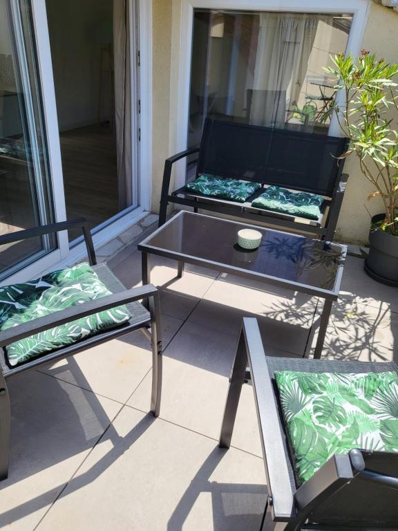 Posezení v ubytování La Dolce Vita Nîmoise Terrasse 100 m des Arènes