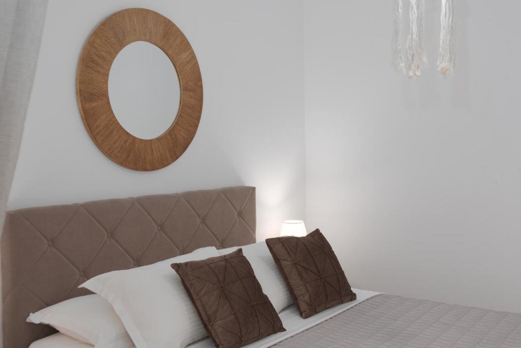 Postel nebo postele na pokoji v ubytování G&J Deluxe Apt II