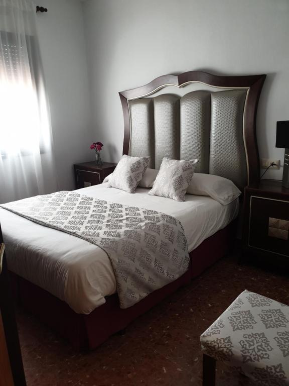 Postel nebo postele na pokoji v ubytování Casa Maria