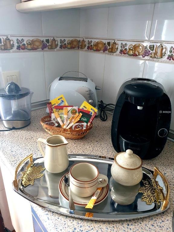 Příslušenství pro přípravu čaje a kávy v ubytování Casa Maria