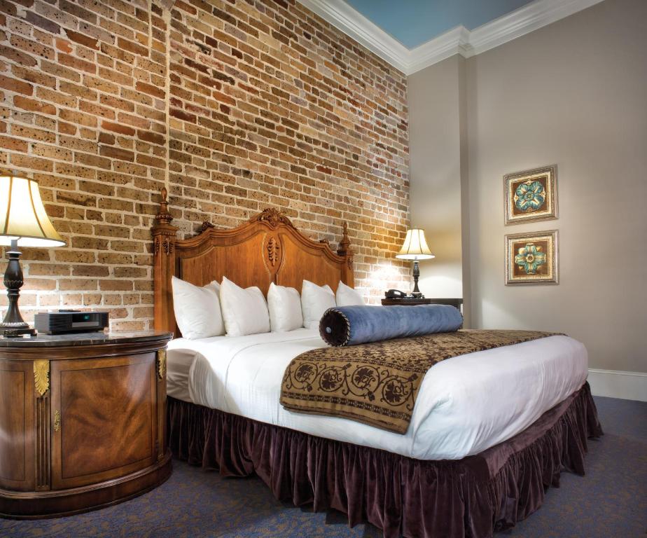 מיטה או מיטות בחדר ב-Club Wyndham La Belle Maison