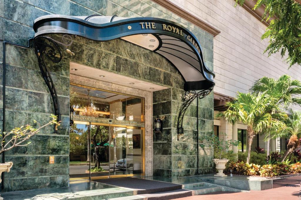 a store front of a building with a sign on it at Wyndham Vacation Resorts Royal Garden at Waikiki in Honolulu