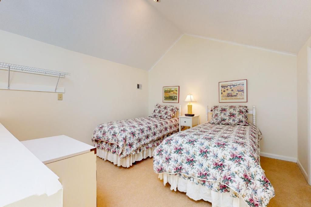 Postel nebo postele na pokoji v ubytování Seaside Villas --- 40123 Seaside Drive