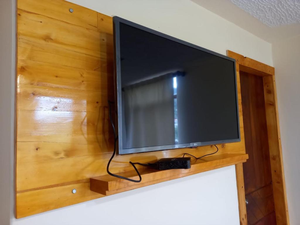 TV a/nebo společenská místnost v ubytování Bonanza Hospedaje