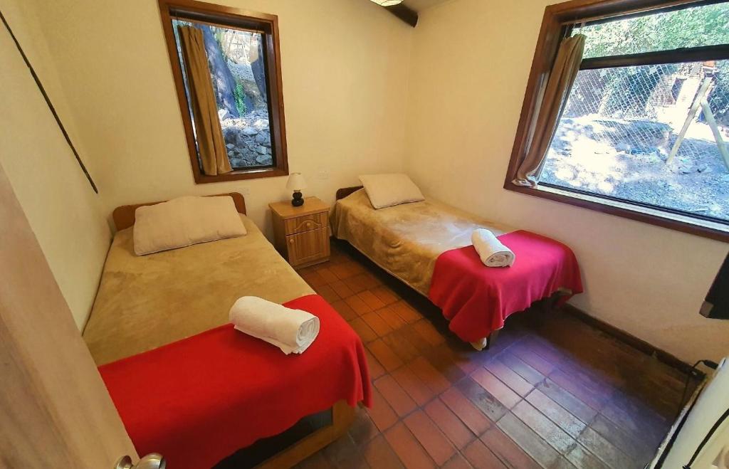 Postel nebo postele na pokoji v ubytování Cabañas Piedra Luna