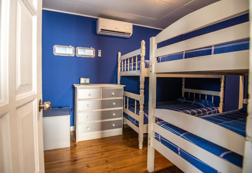 Postel nebo postele na pokoji v ubytování Moon Apartments