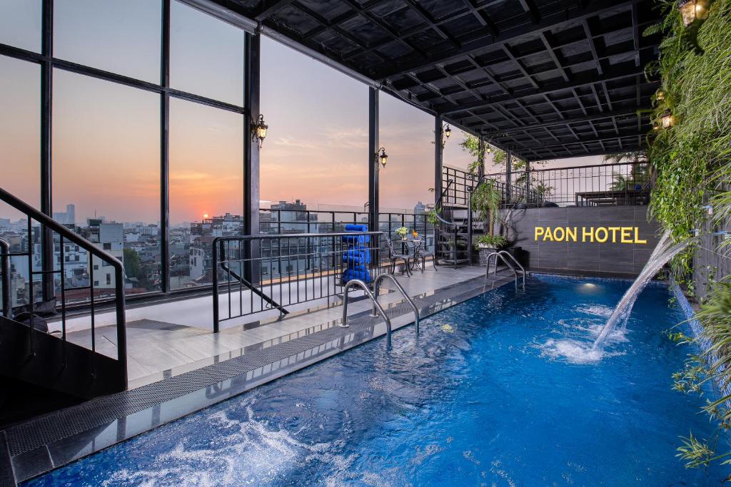a pool on the top of a building at Hanoi Paon Hotel & Spa in Hanoi