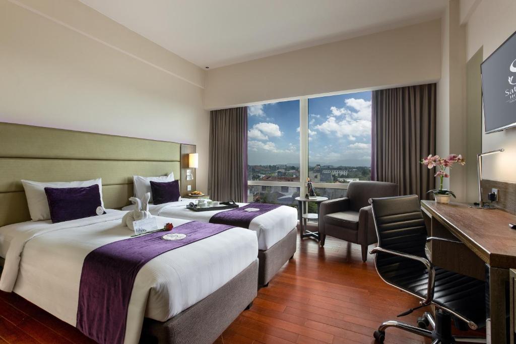 Postel nebo postele na pokoji v ubytování Satoria Hotel Yogyakarta - CHSE Certified
