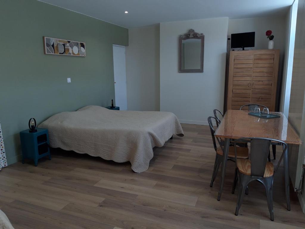 Postel nebo postele na pokoji v ubytování La Cense Hebron