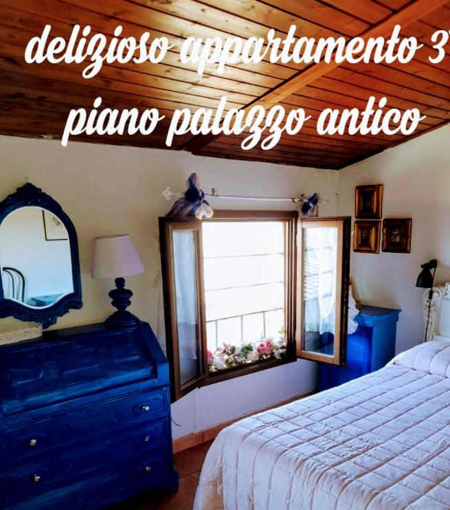 Posteľ alebo postele v izbe v ubytovaní Appartamento “Il Borgo”