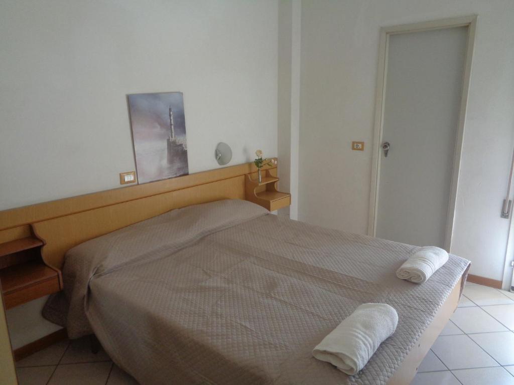 Postel nebo postele na pokoji v ubytování Hotel Gazza