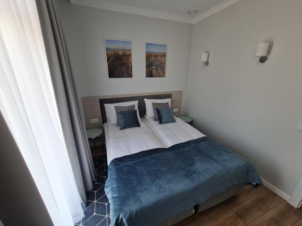 Posteľ alebo postele v izbe v ubytovaní Villa Babette - PARKING, Wi-Fi, sprzatanie - wszystko w cenie!