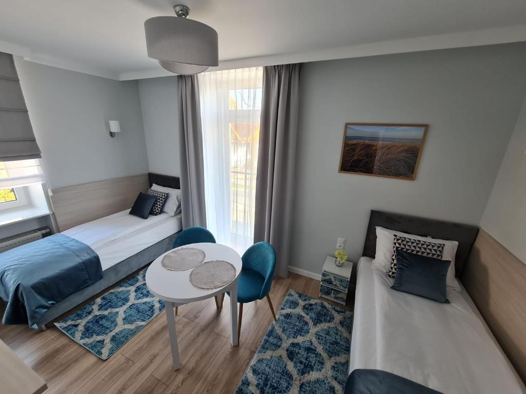 Posteľ alebo postele v izbe v ubytovaní Villa Babette - PARKING, Wi-Fi, sprzatanie - wszystko w cenie!