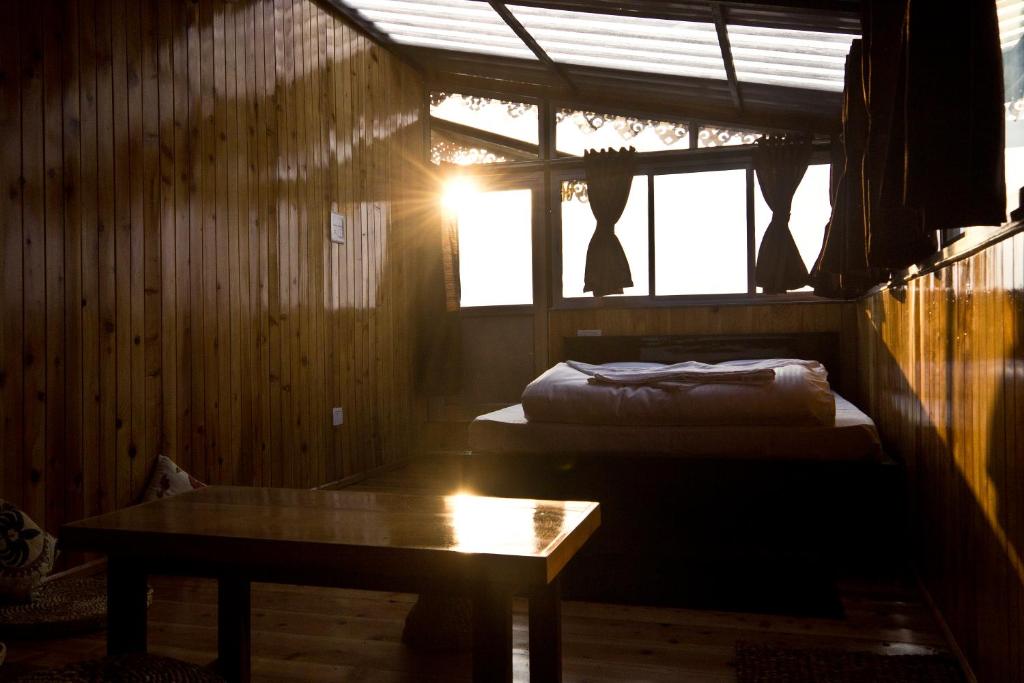 Postel nebo postele na pokoji v ubytování the DEW DROP HOME STAY