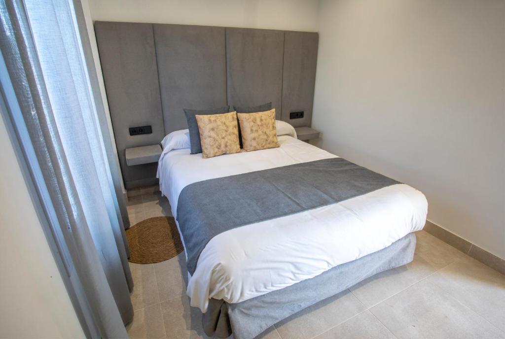 Posteľ alebo postele v izbe v ubytovaní ON City Apartments