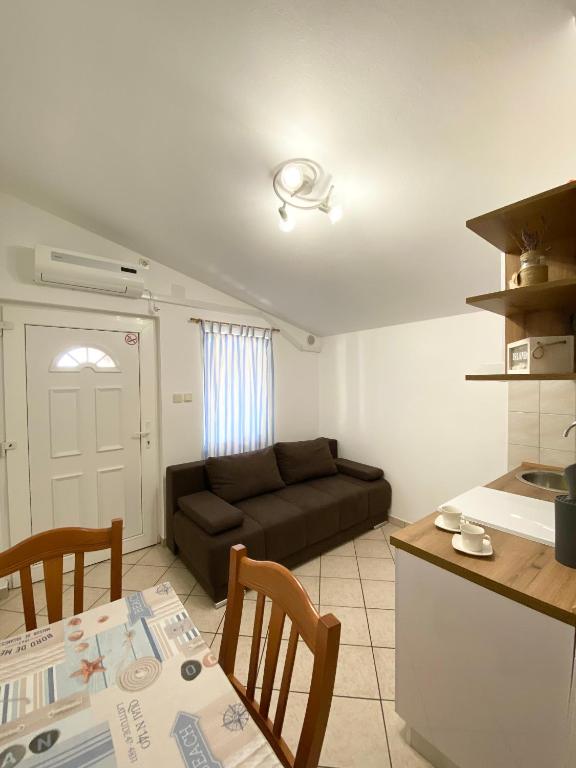 Posedenie v ubytovaní Apartments LucMar