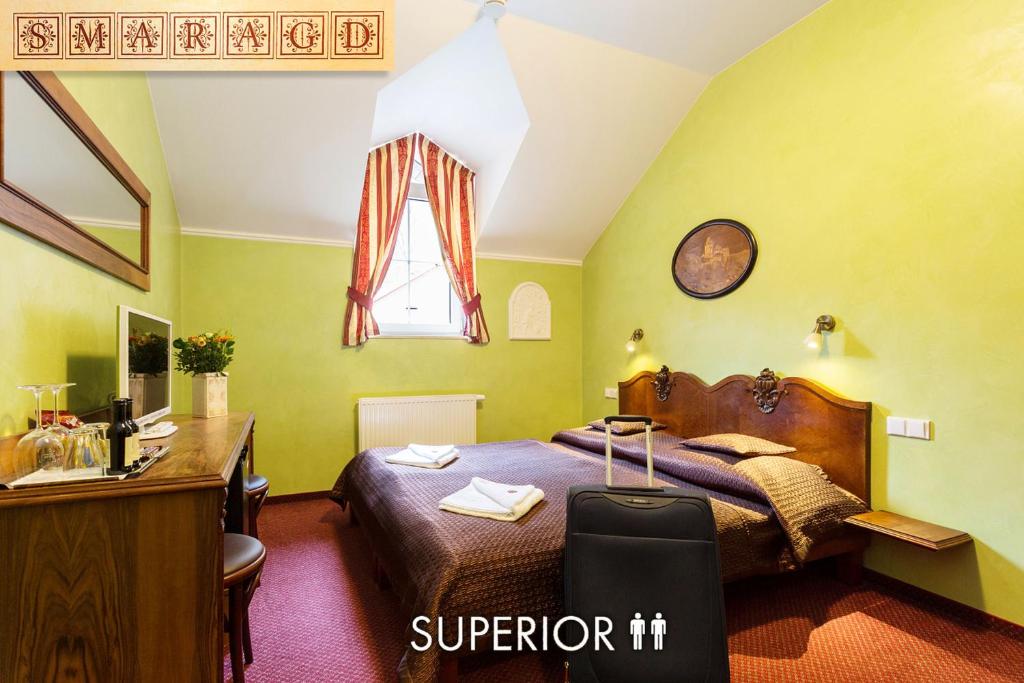 Postelja oz. postelje v sobi nastanitve Hotel Karlštejn & SPA