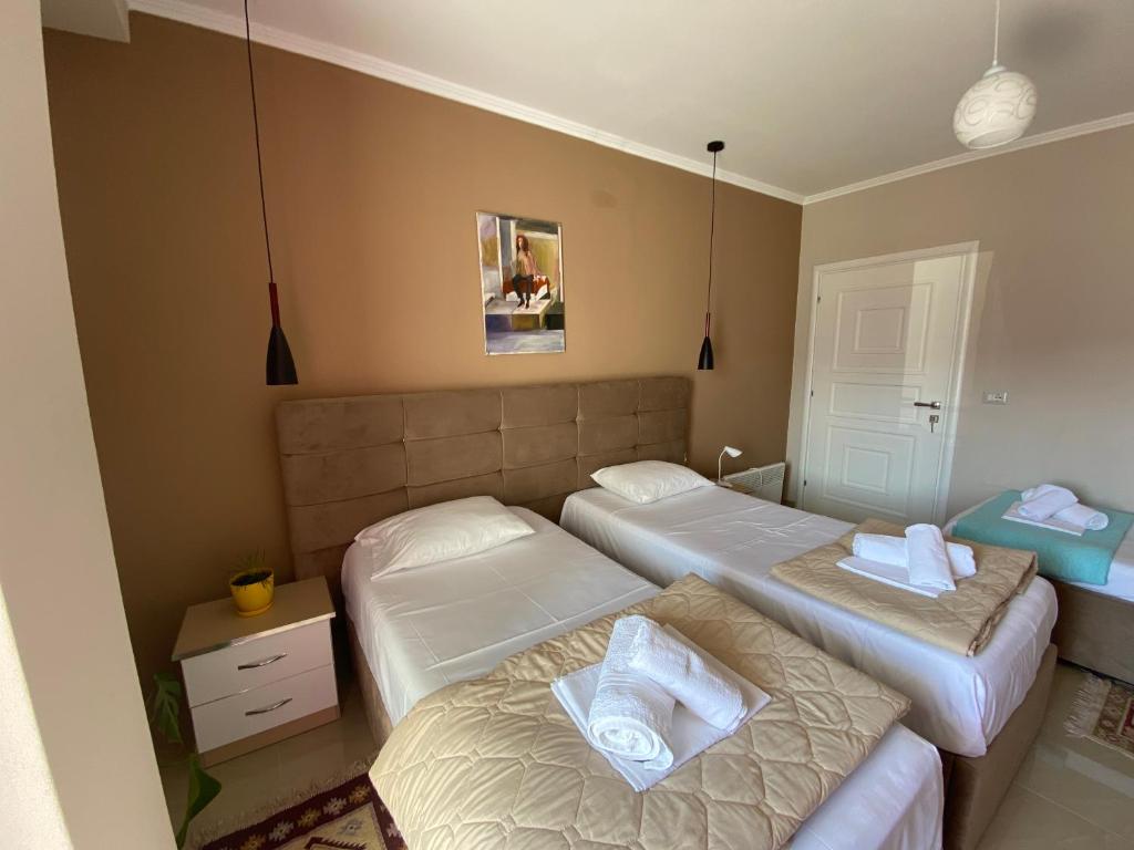 Postel nebo postele na pokoji v ubytování Guest's Apartament